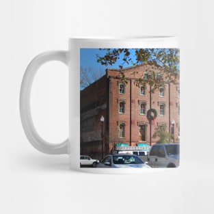 Holiday Wreaths On Building Mug